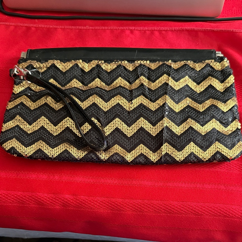 Chevron Sequin Clutch in Black and Gold. Like new.